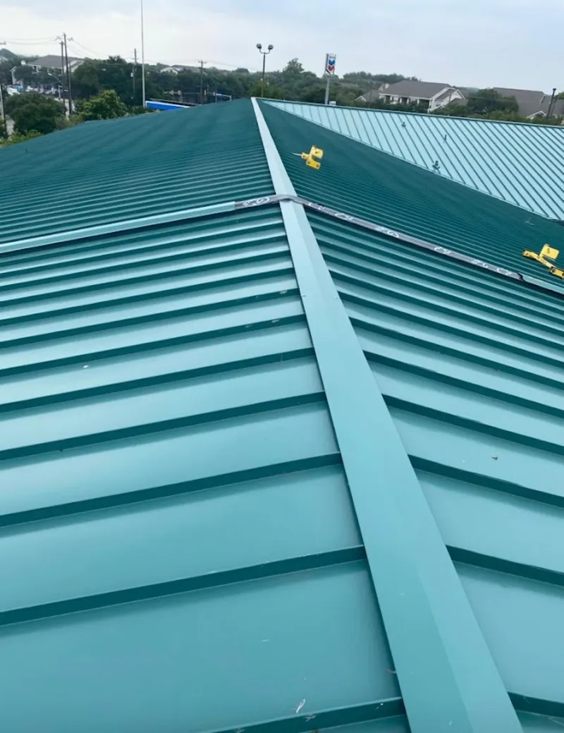 Green commercial metal roof ridge and valley for Metal Roof Repair in Indian Harbour Beach